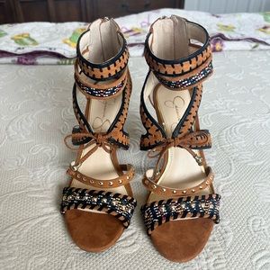 Jessica Simpson tassled, beaded, brown suede heels in size 6.5 with 4” heels.